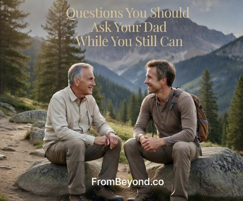 A father and son sitting together outdoors in nature, talking
